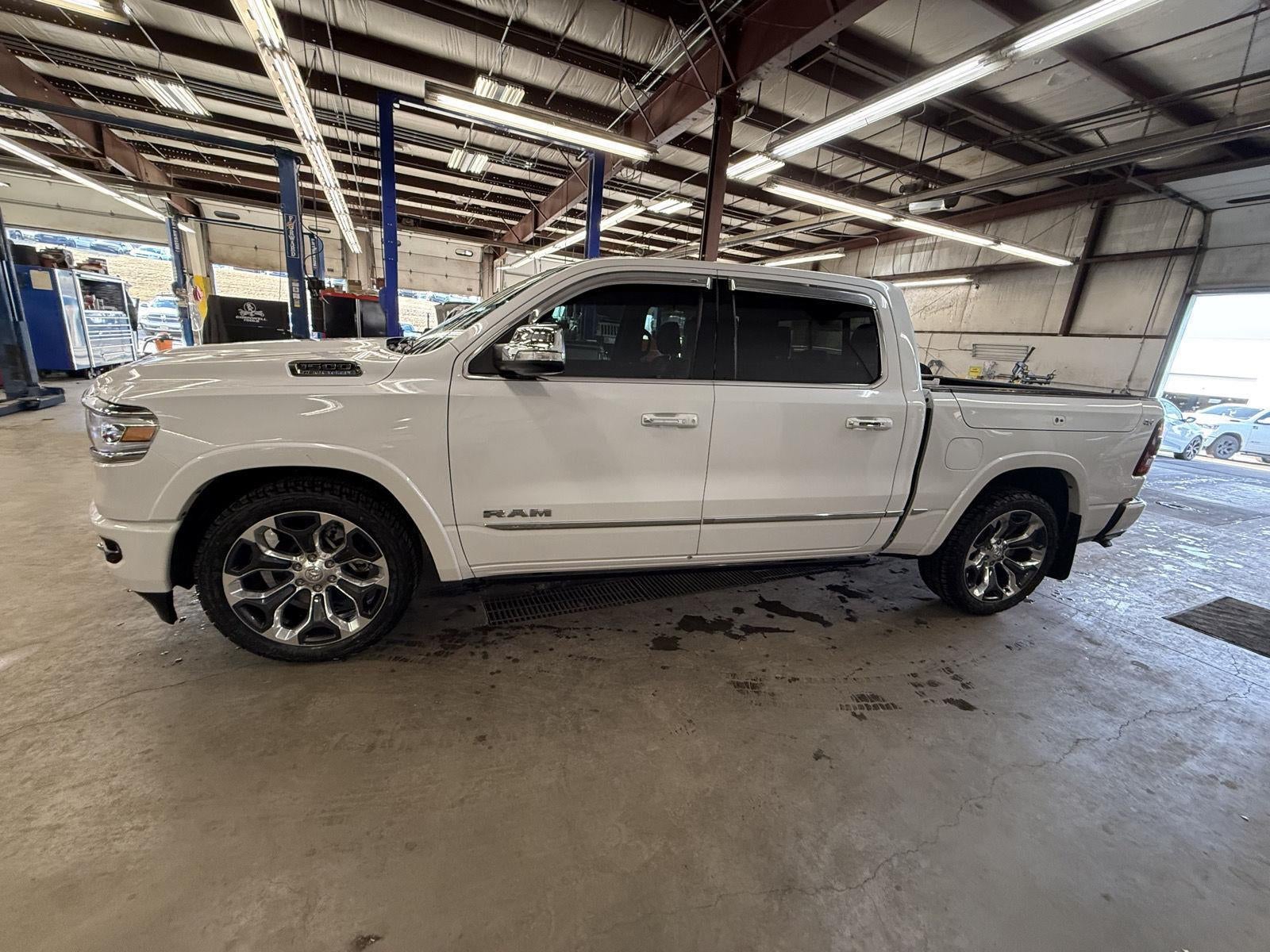 Used 2021 RAM Ram 1500 Pickup Limited with VIN 1C6SRFHTXMN513997 for sale in Kansas City