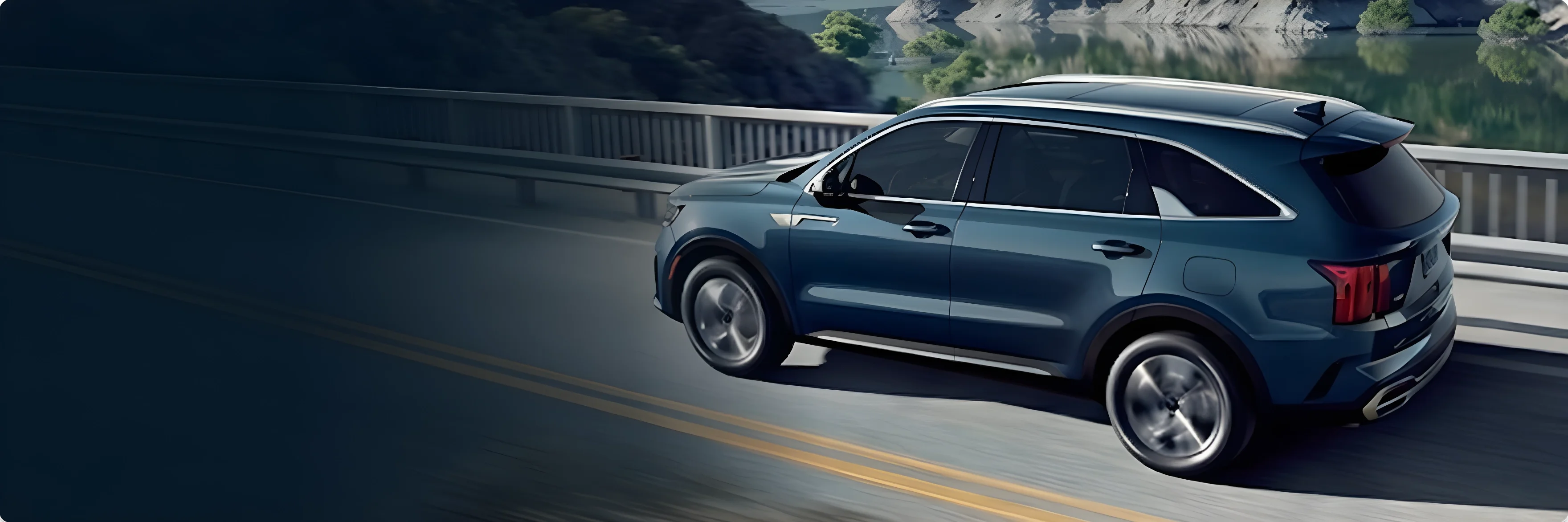 Teal blue Kia Sorento driving across a bridge beside a lake