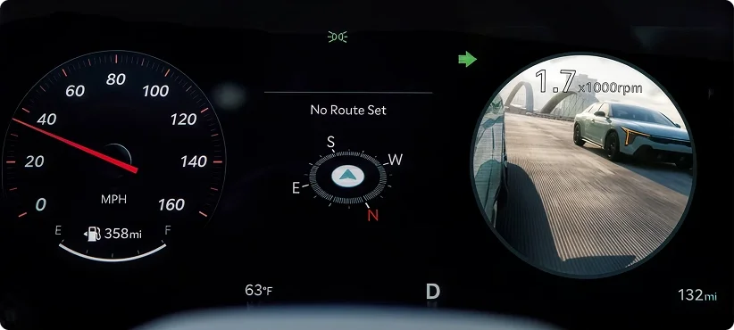 2026 Kia K4 digital instrument cluster showing the speedometer beside a circular blind-spot camera feed of the adjacent lane