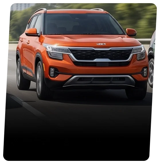 Orange Kia Seltos SUV shown from the front three-quarter view on a tree-lined road