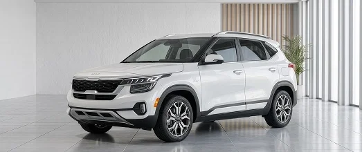 White Kia SUV shown from the front three-quarter view in a bright showroom