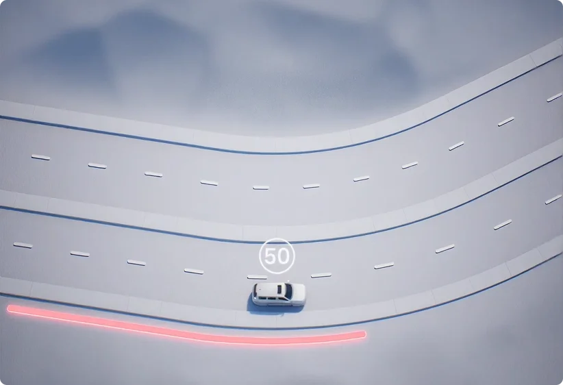 Illustration of a vehicle approaching a highway curve marked with a 50 speed limit sign and a red path line through the bend