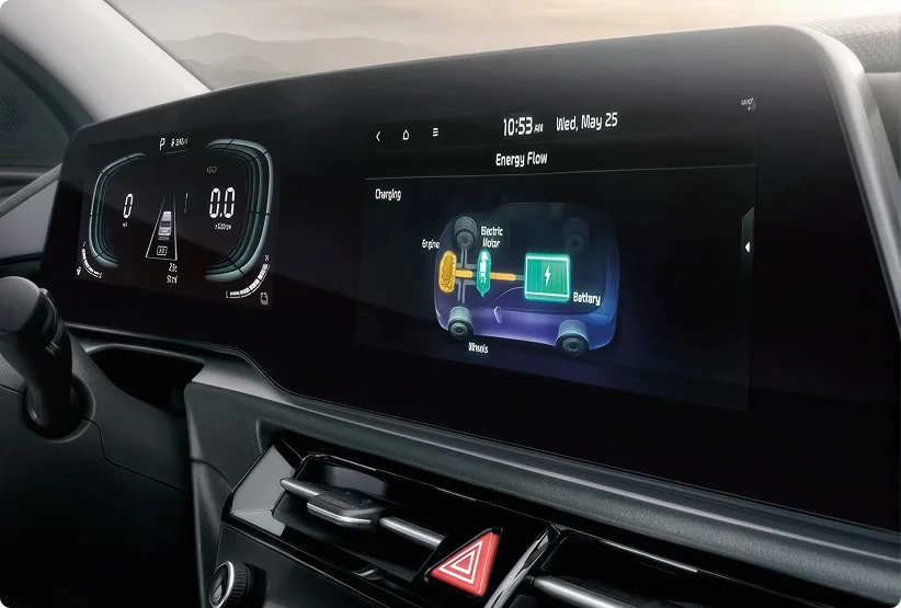 2026 Kia Niro Hybrid dashboard with the digital cluster and touchscreen showing the hybrid energy flow diagram