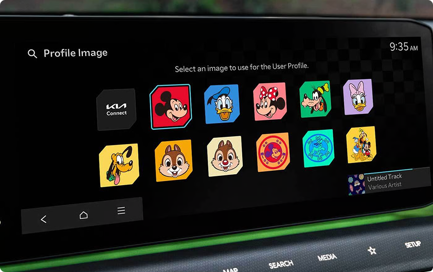 Touchscreen profile picker showing a grid of Disney character display themes