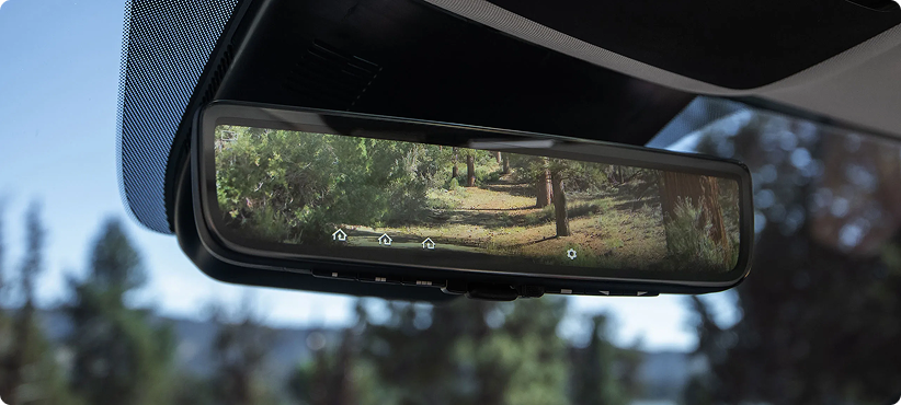 Full Display Mirror showing a clear camera view of the road behind the vehicle
