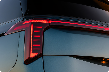 Close-up of the 2027 Carnival MPV's illuminated vertical tail light