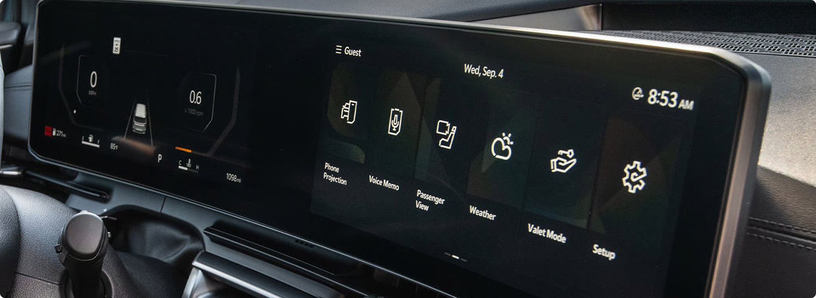 Carnival MPV panoramic display showing the home menu of vehicle feature icons