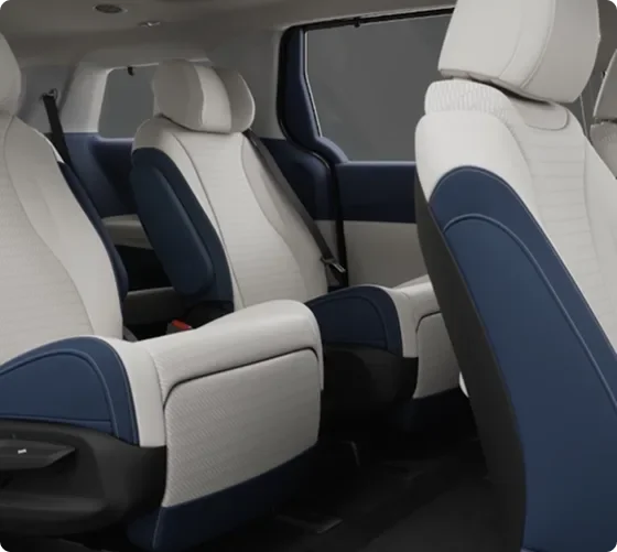 Carnival MPV Hybrid second-row captain's chairs in cream and navy leather