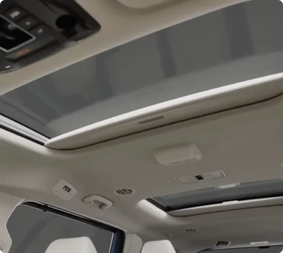 Interior view looking up at the Carnival MPV Hybrid's dual power sunroofs