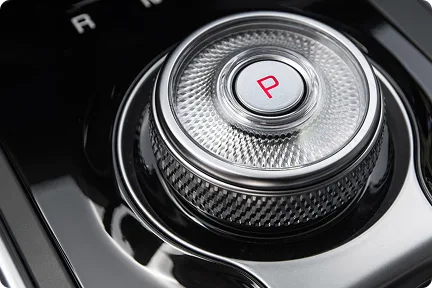 Close-up of the Carnival MPV Hybrid's rotary gear selector in Park