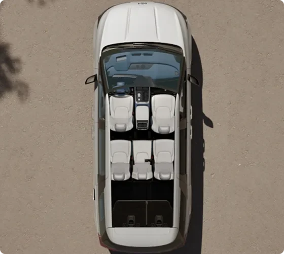 Overhead cutaway view of the Carnival MPV Hybrid cabin showing all three seating rows