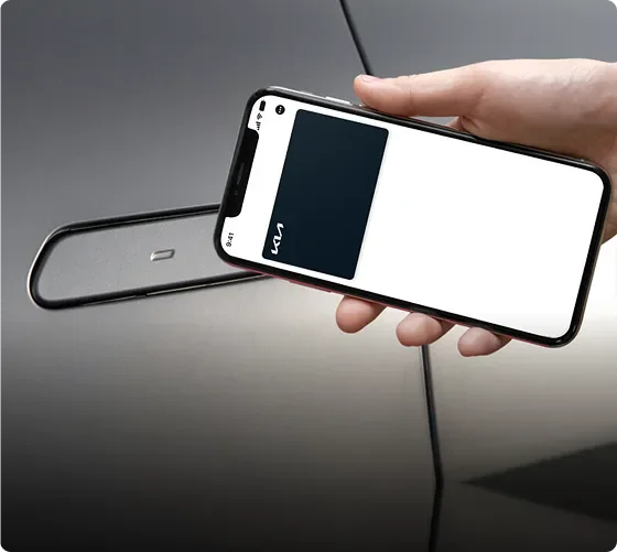 Hand holding a smartphone acting as a Digital Key 2.0