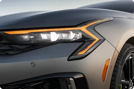 Close-up of the Kia K5's LED headlight