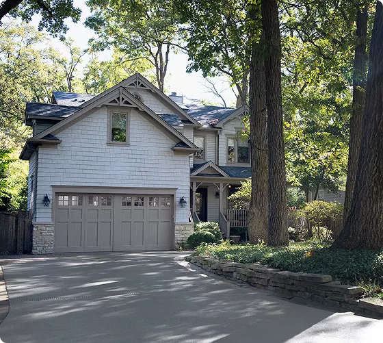 Suburban home with a garage door controlled by Kia myQ