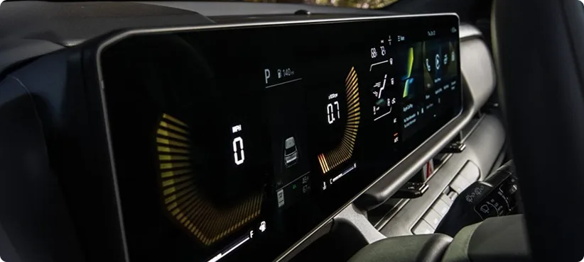 Close-up of the Seltos digital cockpit showing the instrument cluster and touchscreen