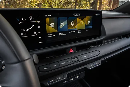 Seltos infotainment and climate screens seen from the driver's seat