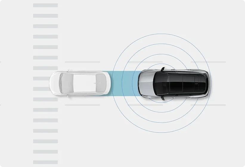 Illustration of Auto Emergency Braking detecting an approaching vehicle at a junction