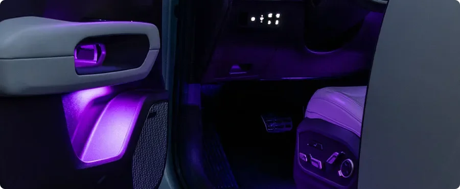 Telluride Hybrid door and dashboard lit by purple ambient interior lighting