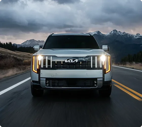 Silver Telluride Hybrid head-on with its LED projector headlights and amber DRLs lit