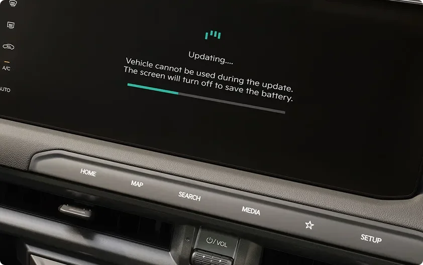 Telluride Hybrid screen mid over-the-air update, reading Updating with a progress bar