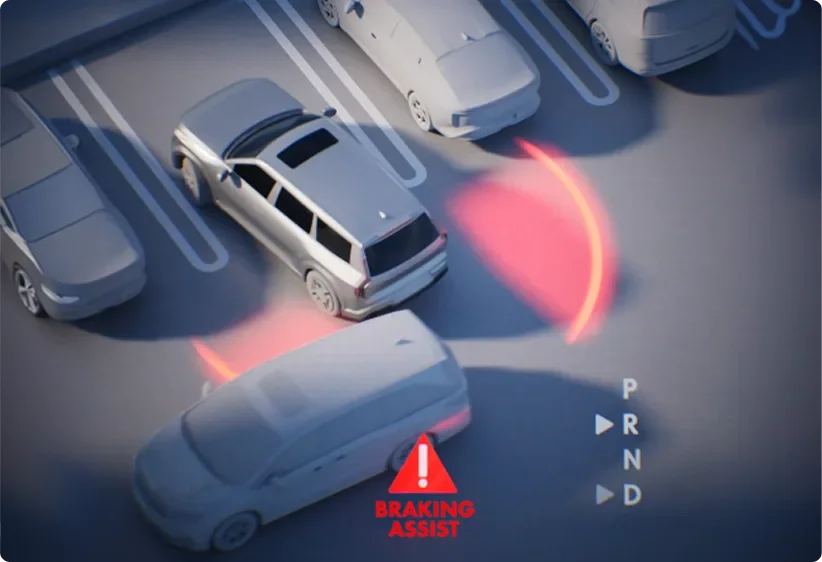 Overhead illustration of a Telluride reversing from a parking space with a red alert zone and P R N D readout