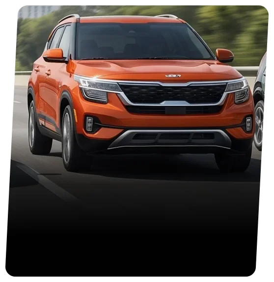 Orange Kia Seltos SUV driving on a tree-lined road