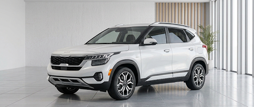 White Kia SUV in a bright studio showroom