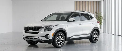 White Kia SUV in a bright studio showroom