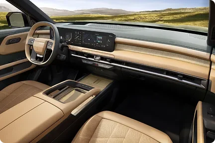 Telluride interior in cream leather with the steering wheel and dual displays