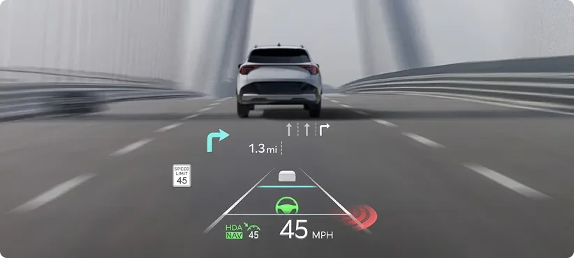 Head-Up Display projected on the windshield showing 45 MPH, a turn arrow and lane guidance