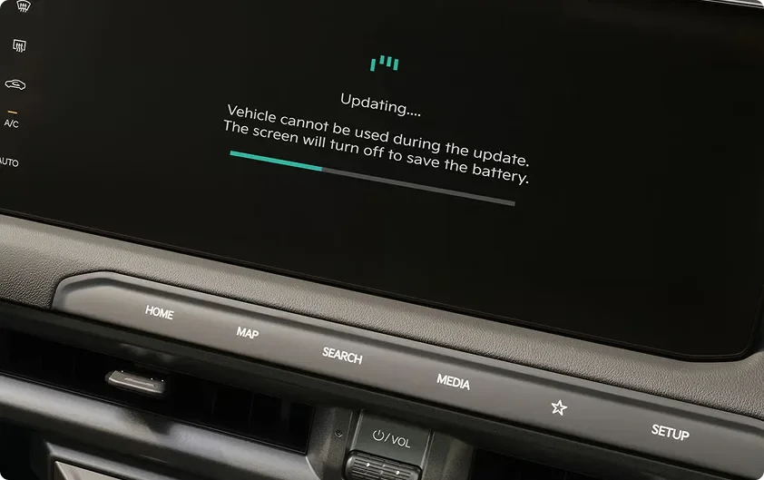 Telluride screen mid over-the-air update, reading Updating with a progress bar