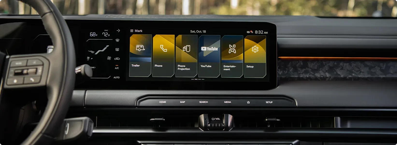 Telluride dashboard with the curved dual display showing the Kia Connect app tiles